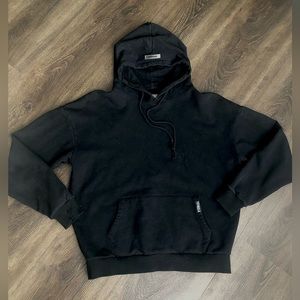 YoungLa black hooded sweatshirt.